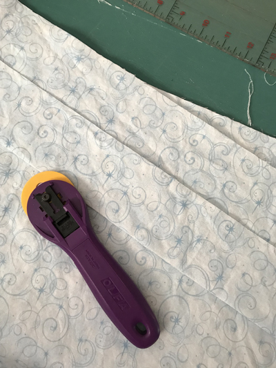 Cutting fabric for quilt www.dlstewart.com