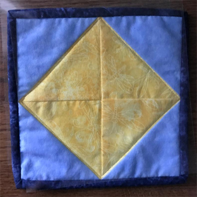 Plant Mat with dragonfly print