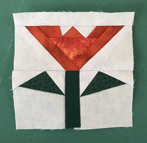 Orange paper pieced flower www.dlstewart.com